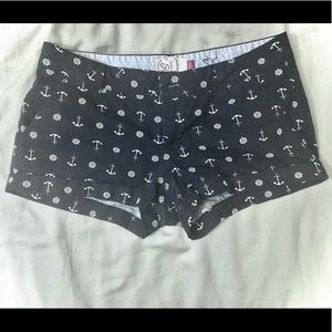 Black and white shorts by SO.